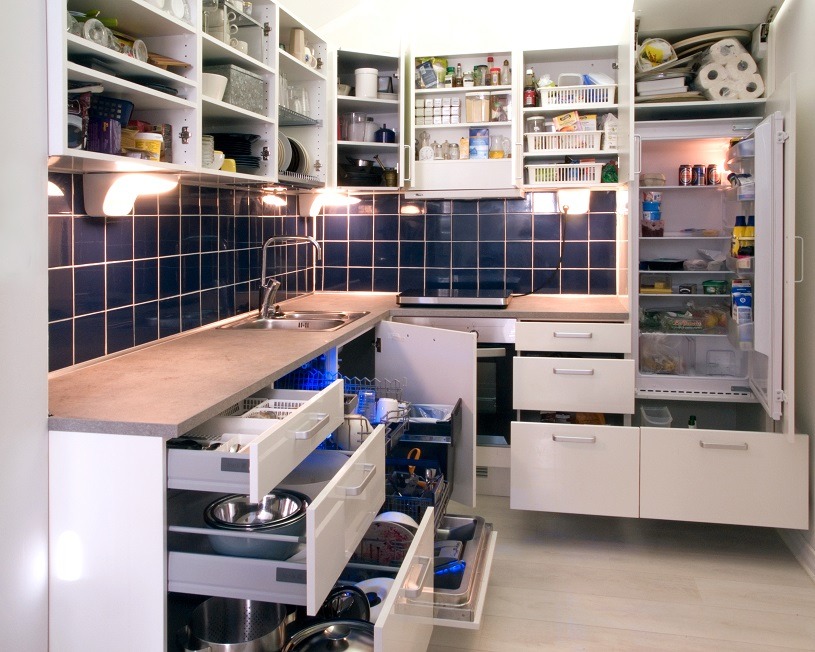 white kitchen with drawers open